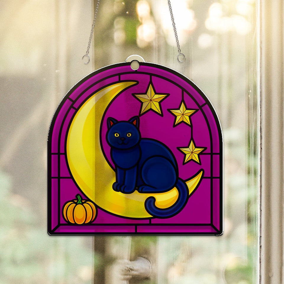 Black Cat Crescent Moon Acrylic Suncatcher hanging in a sunny window
