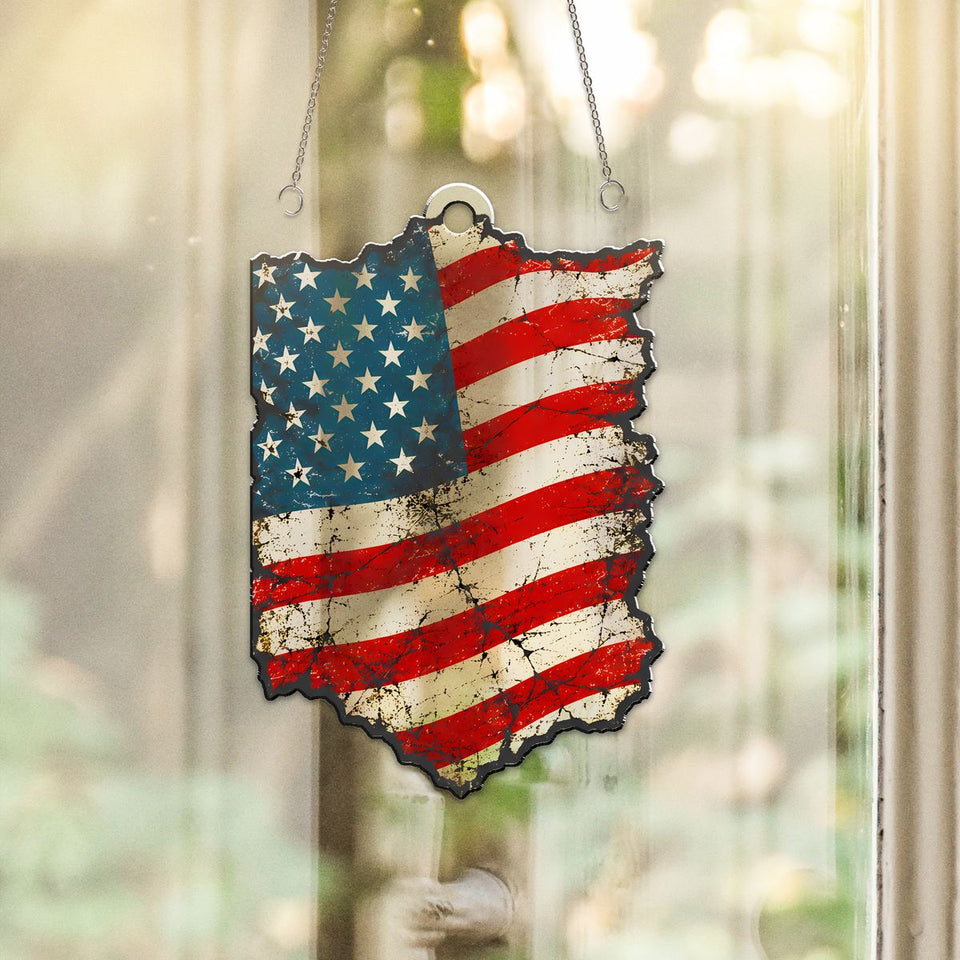 Waving American Flag Acrylic Suncatcher hanging in a sunny window